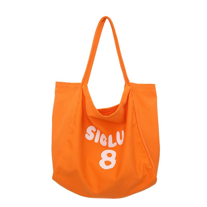 Spring and summer new printed canvas bag women's niche design large-capacity shoulder bag lazy atmosphere tote bag