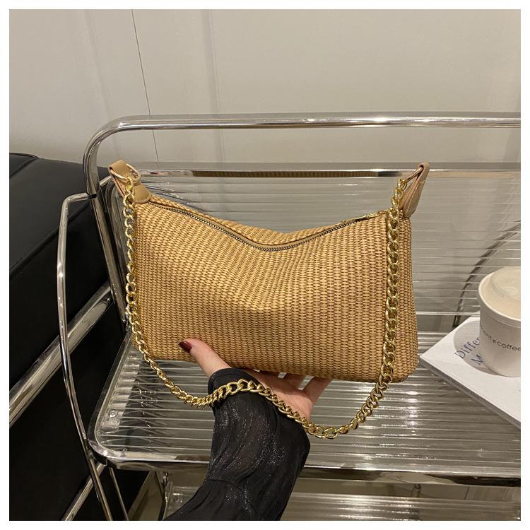 2025 new holiday style straw weaving women's summer popular weaving seaside beach large capacity chain shoulder tote bag