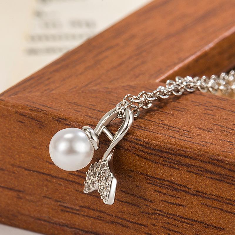 

Женское ожерелье с кулоном в виде кристальной русалки и жемчуга one size