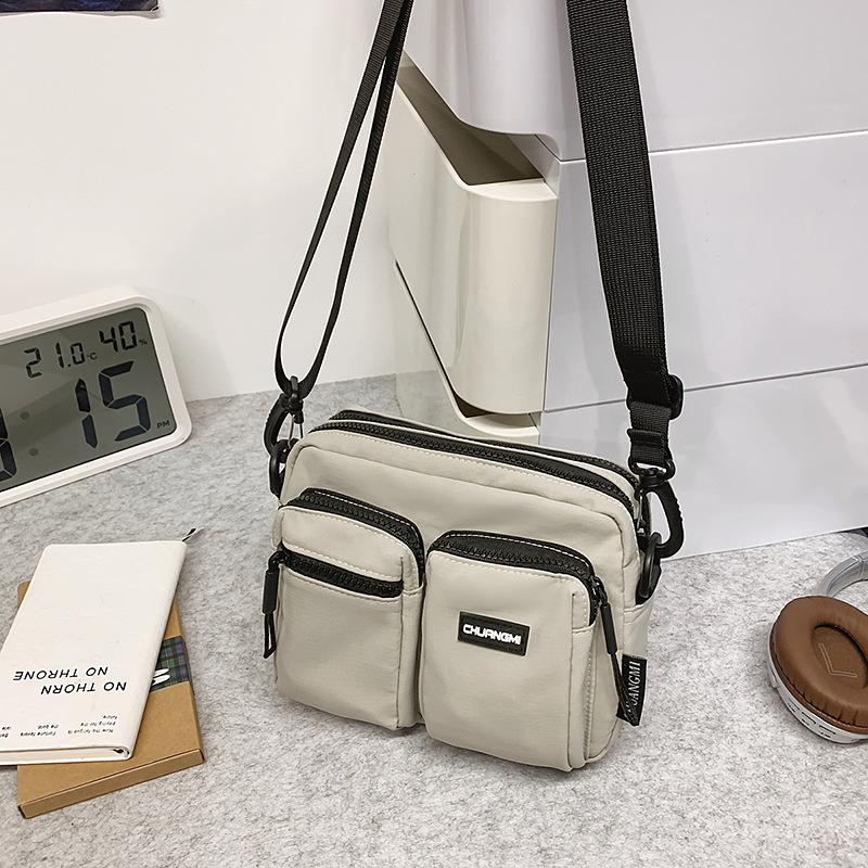 Versatile Messenger Bag Women's Casual Simple Shoulder Bag Versatile Lightweight Sports Mobile Phone Small Square Bag Small Backpack Men