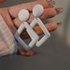 French personalized milky white retro earrings simple hollow rhombus geometric stud earrings women's fashion versatile ear jewelry earrings
