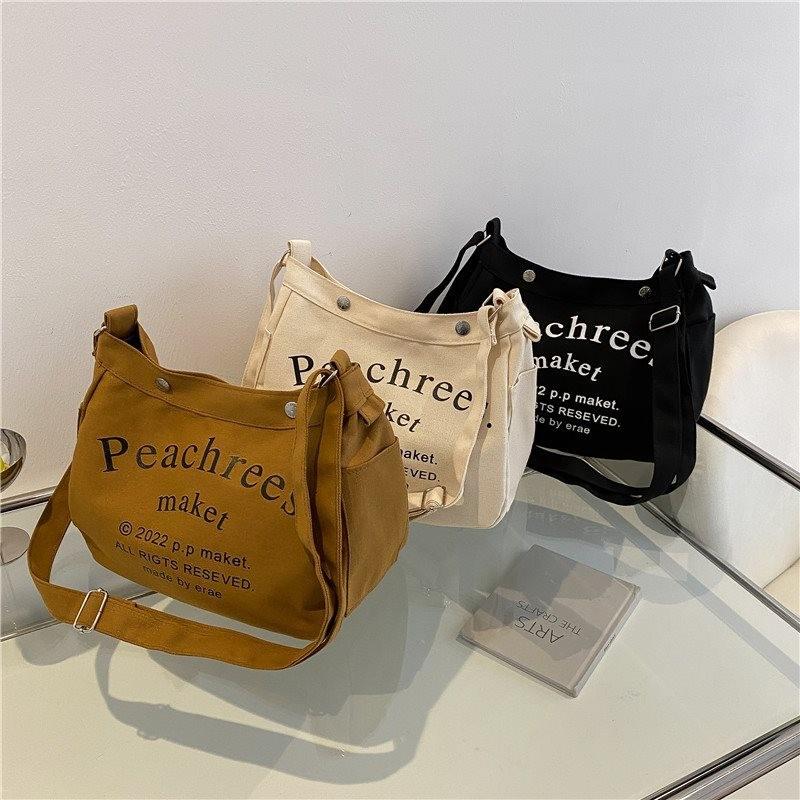 Stylish Korean Vintage Canvas Tote Bag For Women With Spacious Capacity And Trendy Lettering In Cream Brown Or Black
