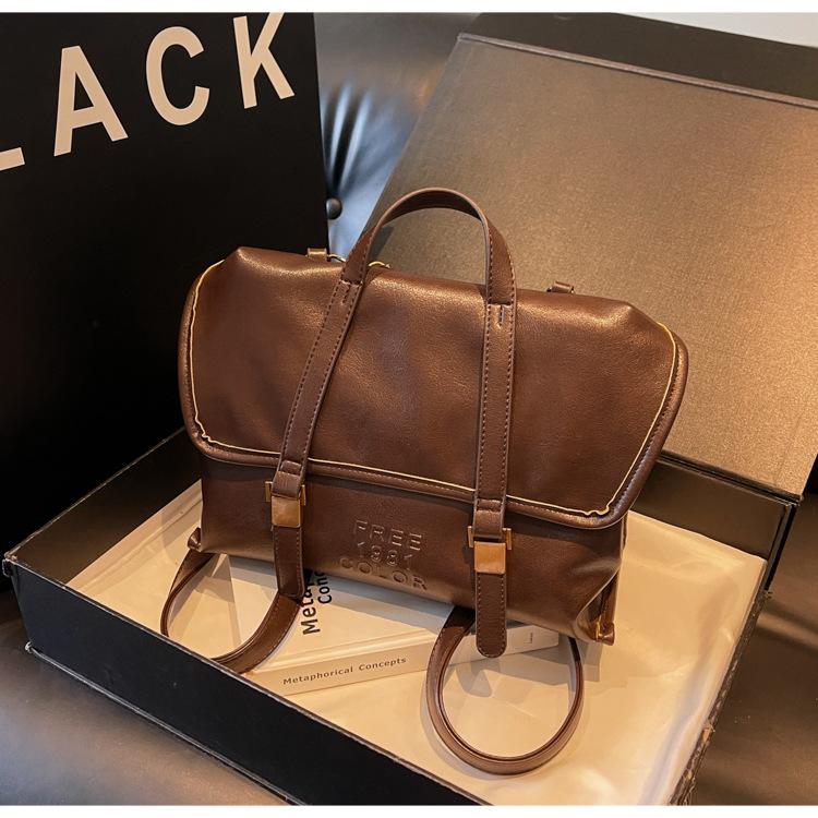 

Large capacity commuter tote bag women s autumn and winter leisure 2024 new single shoulder crossbody multi-functional backpack темно-коричневого кольору