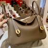 2025 New Style Womens Bag Real Leather Single Handle Tote Bag Top Handle Bag All-Match Lindy Bag Doctors Bag Mini