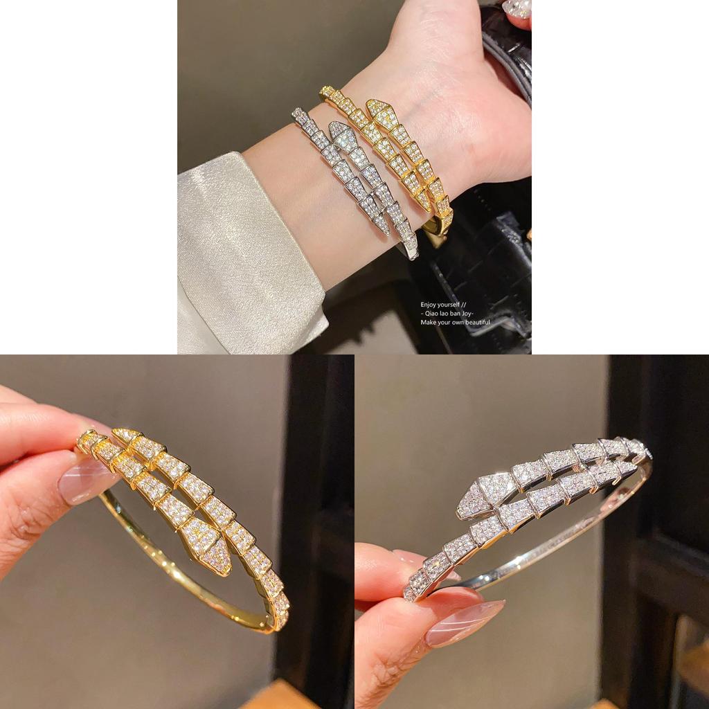 Bracciale di lusso a forma di serpente in rame placcato oro con accenti di zirconi per fashioniste