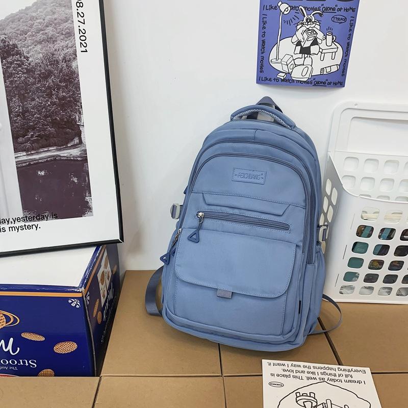 Schoolbag schoolbag for female college students Korean version of junior high school students High school large capacity weight reduction backpack