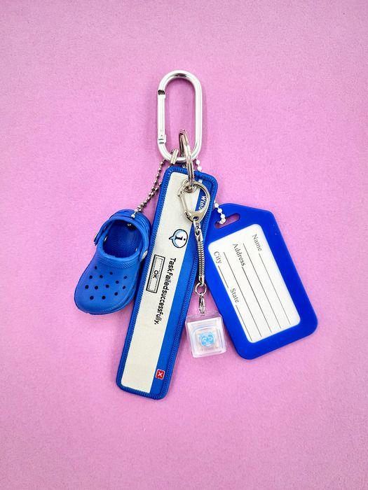 

SATTCHI ALERT POPUP FIDGET TOY CHARM Blue