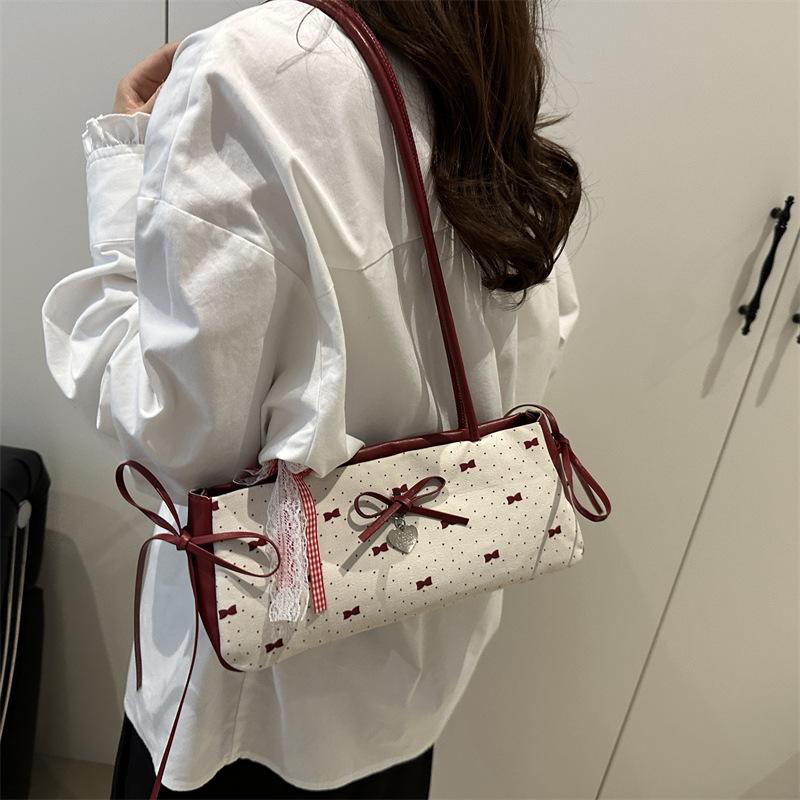 Fashion versatile sweet bow underarm bag women's 2025 summer simple niche high-end single shoulder handbag