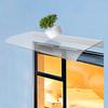 Durable front door canopy with 31.5*15.75in coverage, made of high-quality PC, protects against rain, sun, and wind, stylish