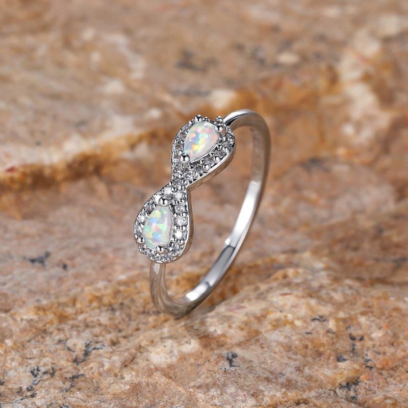 

Gold white diamond opal edge inlaid with light white diamond ring European and American jewelry ancient method No. 10