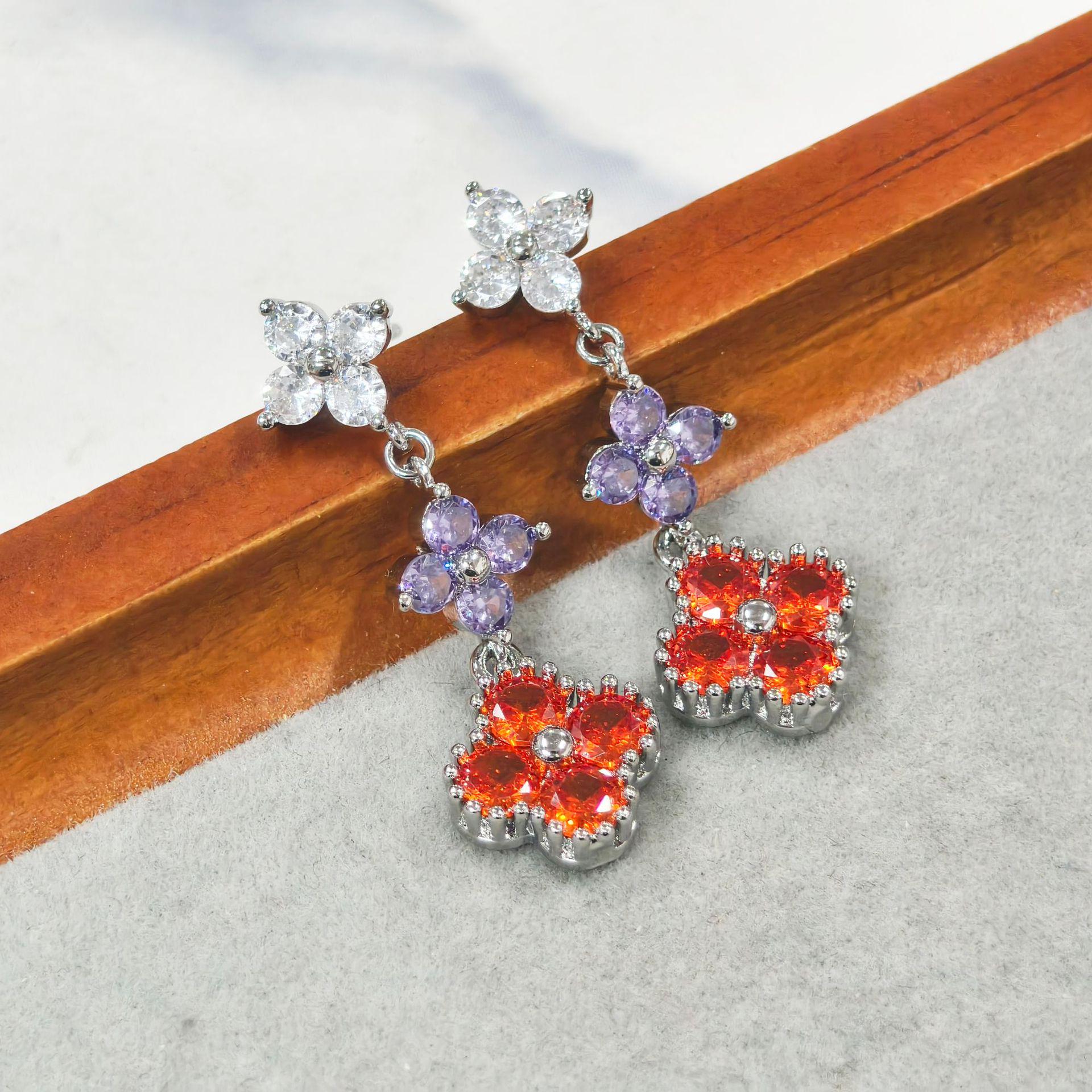 Gessen Jewelry Four-Leaf Clover Stud Earrings with Colorful Zirconia Stones - Elegant and Trendy Design