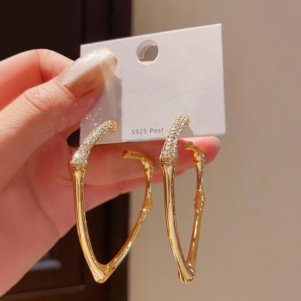 Diamond bamboo curved stud earrings light luxury niche design earrings earrings European and American exaggerated earrings women