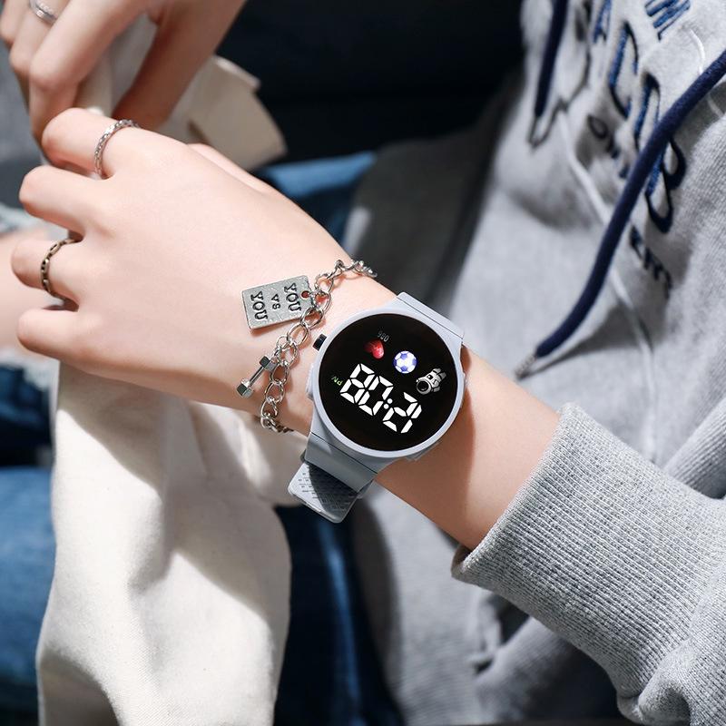 Popular And Stylish Round Electronic Watch For Children With Space Man Design High Tech And Trendy