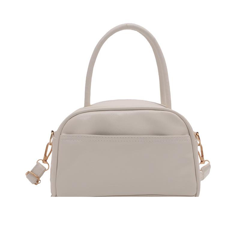 Retro-Texture Bowling Bag: Casual Commute & Niche Design with a Simple, Textured Pillow-Style Shoulder Bag