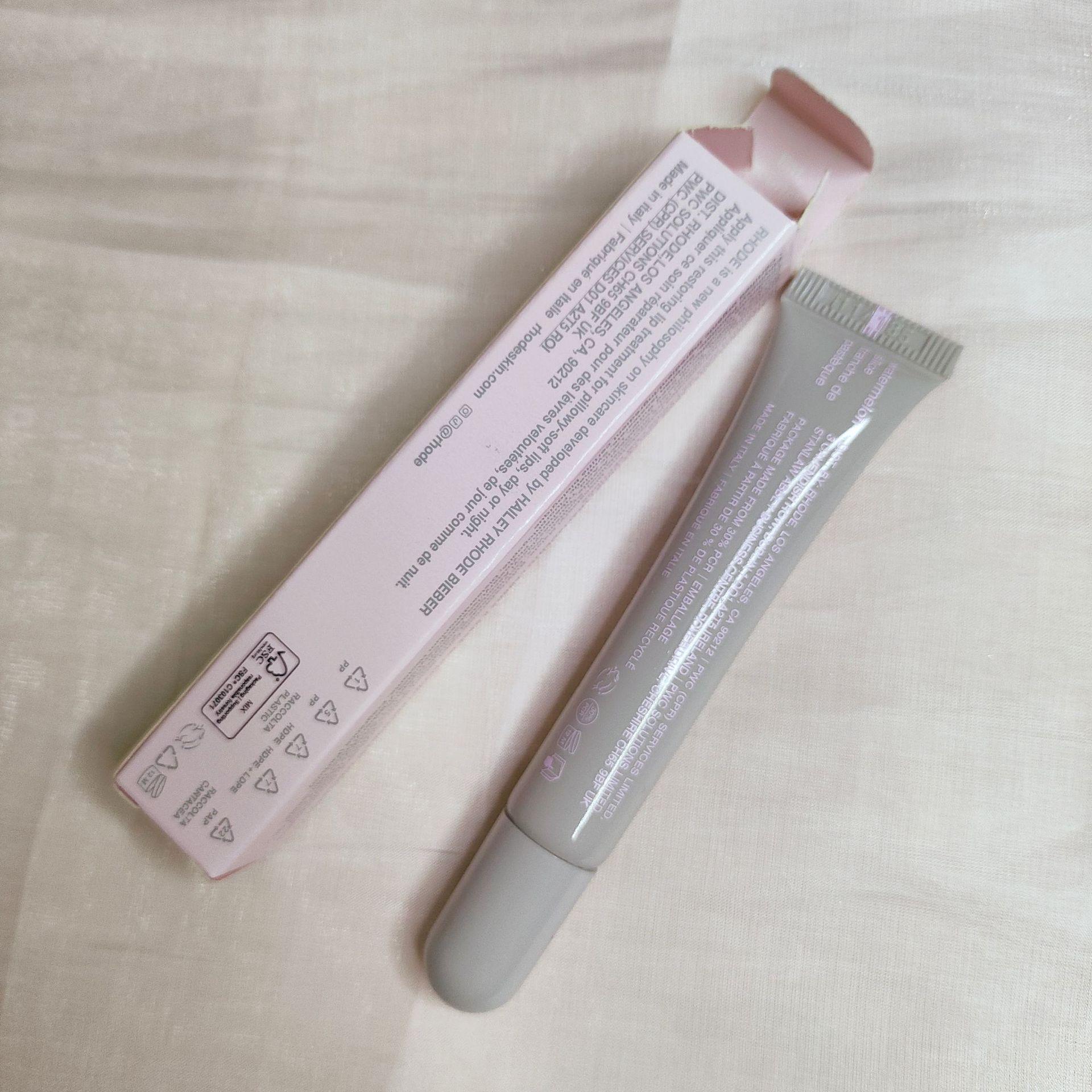 

Rhode Skin от Хейли Персиковый/Гуавовый Желейный Бальзам для Губ - Увлажняющий и Питательный Мягкий Уход за Губами, Новое Цветовое Издание в Чехле для Телефона.