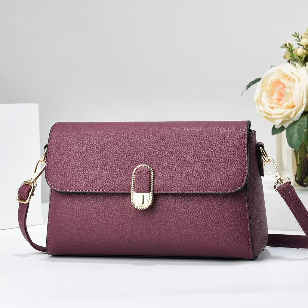 Trendy Medium Sized Crossbody Bag In Purple With Chain And Pocket Features фиолетовый