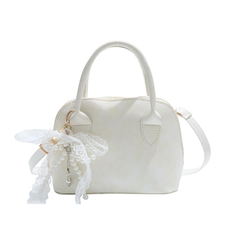 Korean Niche Fashionable Portable Shell Bag Women's 2025 Spring New Foreign Style High Value Single Shoulder Messenger Bag