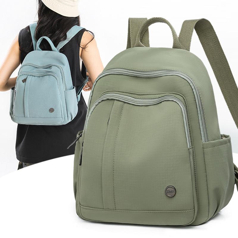 

Lightweight Nylon Backpack Women s Large Capacity Solid Color Backpack Student Schoolbag синій