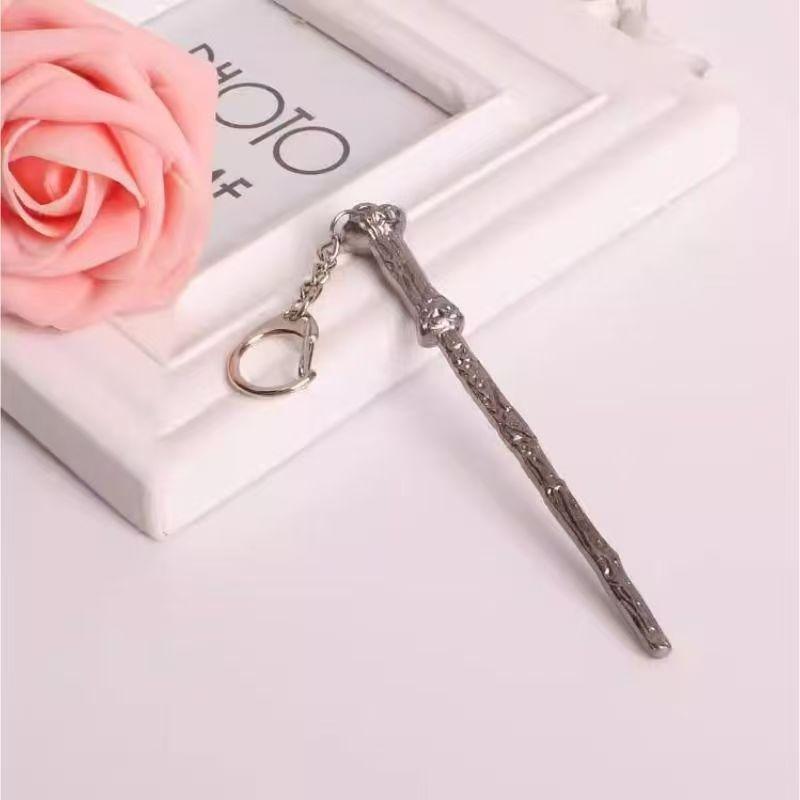 Funko Pop! Keychain Harry Potter Wizard Wand Collectible Key Ring Official Movie Style Mini Wand Pendant, Golden Snitch