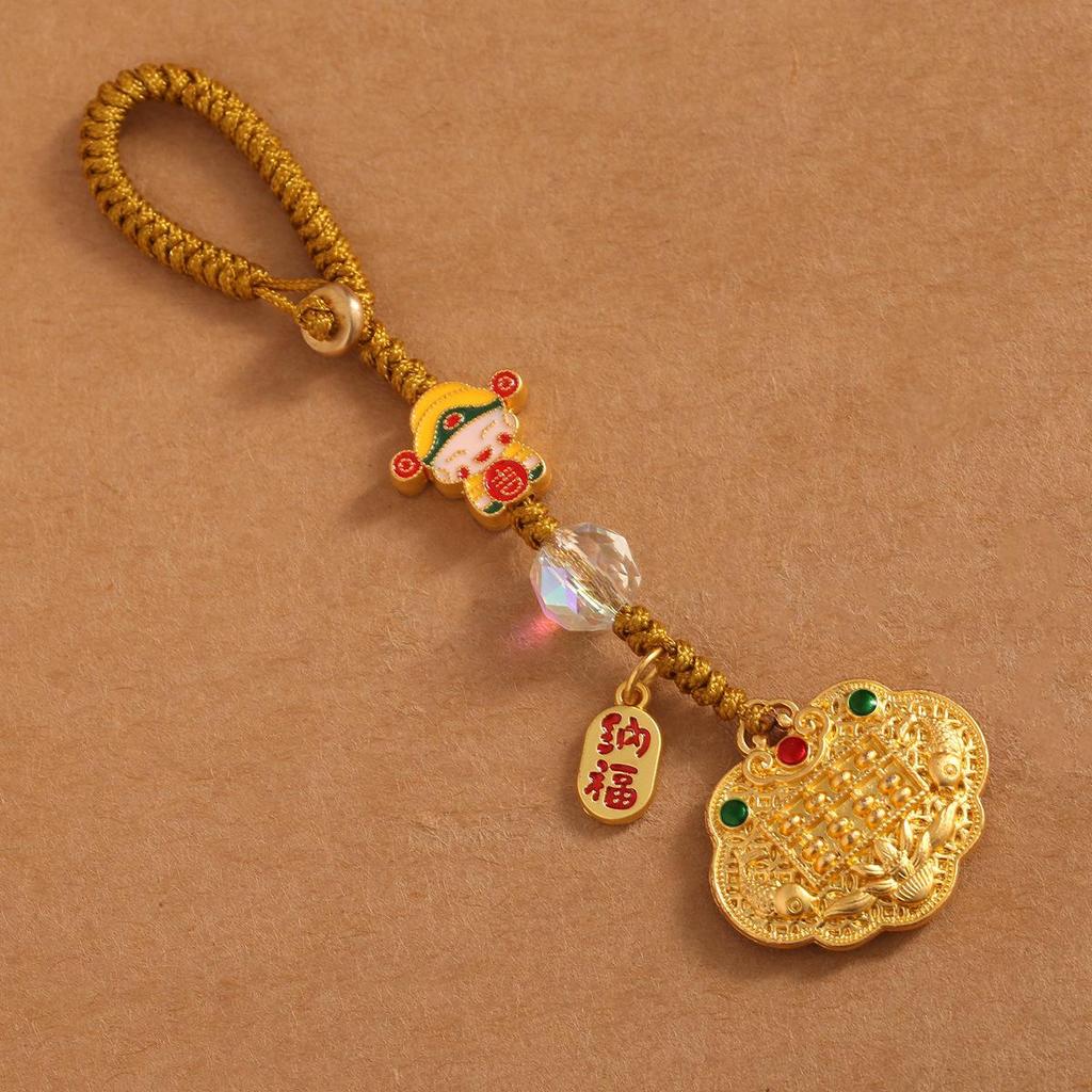 Goldener Glücksschlüsselanhänger: Reichtumsgott verschlingt Goldtier für Familie, perfekt als Auto- oder Handyanhänger.