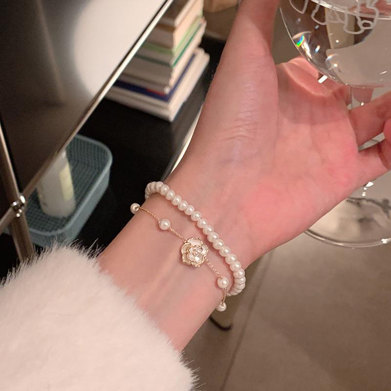 Double-layer pearl camellia bracelet light luxury bracelet elegant and versatile temperament niche jewelry wholesale