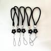 Camellia Four-Leaf Clover PU Leather Phone Wrist Lanyard with Nylon Woven Cord and Phone Case Pendant