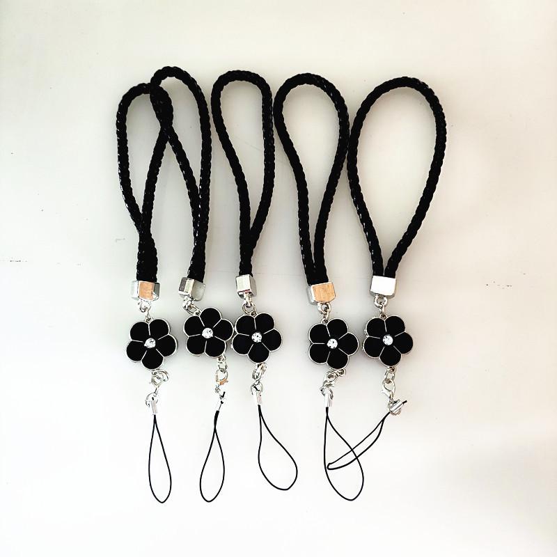 Camellia Four-Leaf Clover PU Leather Phone Wrist Lanyard with Nylon Woven Cord and Phone Case Pendant