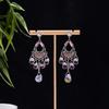Boucles d'oreilles Vintage Style Ethnique Industrie Lourde Cristal Rose à Franges Ambiance Féminine Longues Boucles d'oreilles Style Bohème