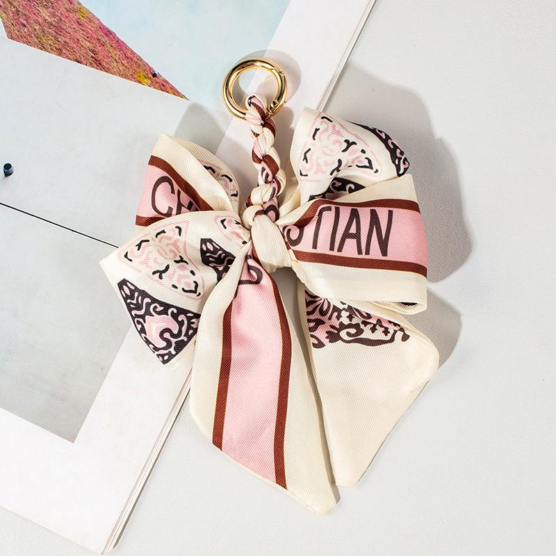 Luxury Bow Chain Bag Charm: Trendy Crossbody Strap and Elegant Pendant Accessory for Influencers