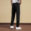 Li Ning Table Tennis Series Brand Logo Side Stripe Straight Leg Drawstring Comfortable Skin-Friendly Sweatpants Unisex pants Black AKLUD91-1