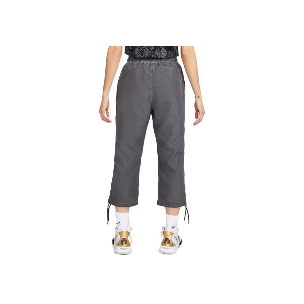 Nike Pantalones Deportivos Sueltos de Secado Rápido Lisos Dri-FIT para Mujer Parte Inferior Negro DH7657-010
