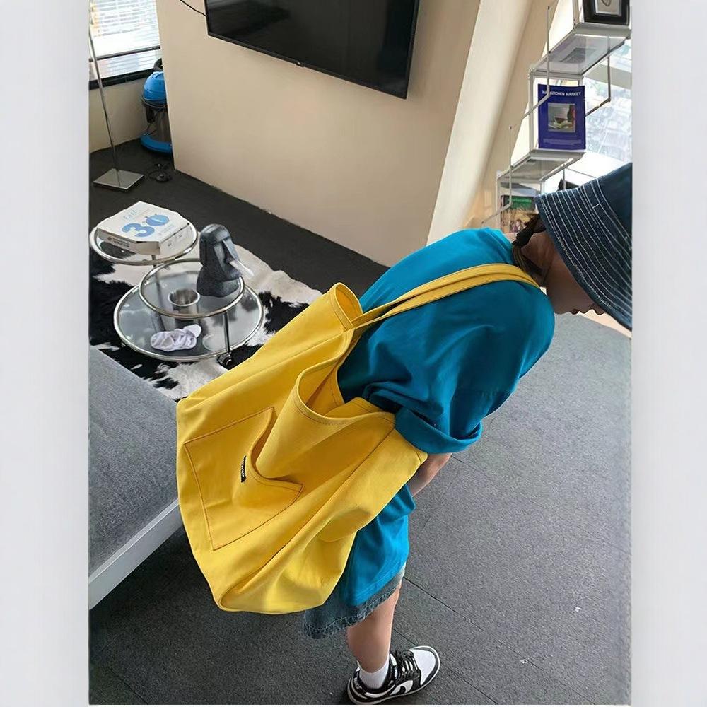 Nische einfarbige Canvas-Tasche Tasche 2025 neue koreanische Version Ins-Stil Umhängetasche einfache lässige große Kapazität Tragetasche