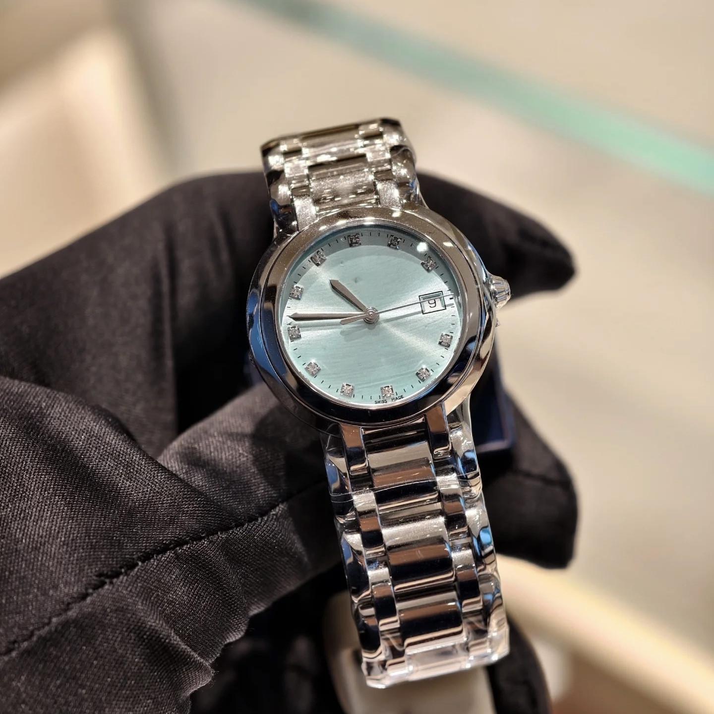 

Жіночий кварцовий годинник серії Heart Moon зі сталевим браслетом та римським перламутровим діамантовим циферблатом