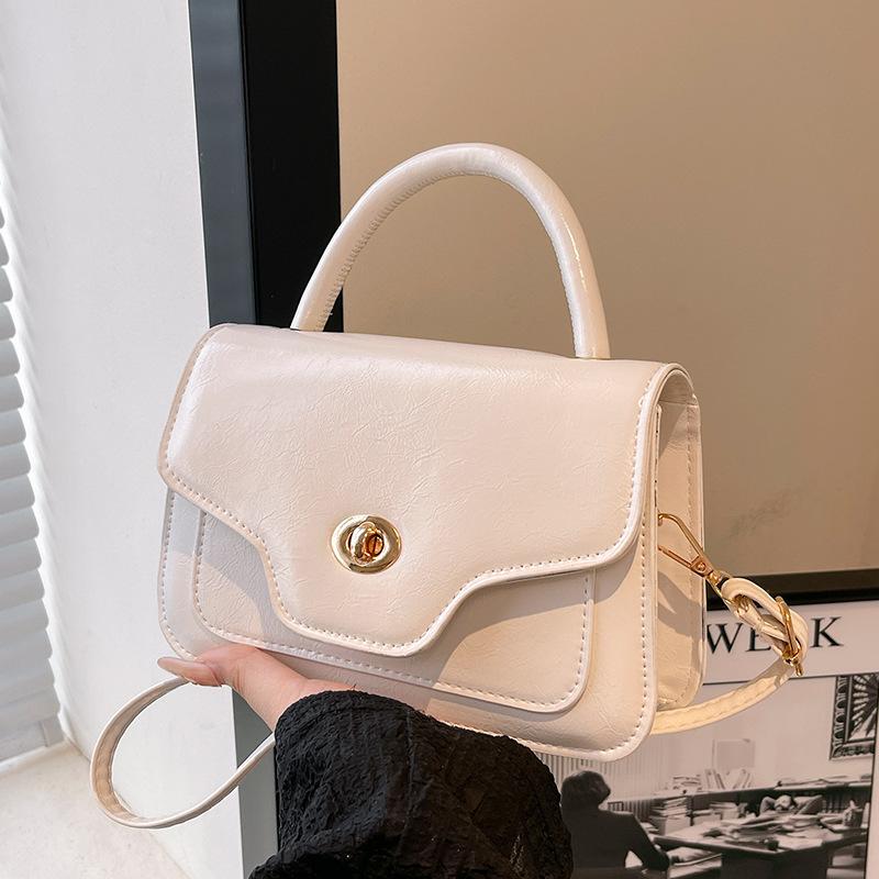 

Премиальная женская сумочка в иностранном стиле 2025 новая летняя простая модная маленькая сумка одно отделение мессенджер маленькая квадратная сумка белый