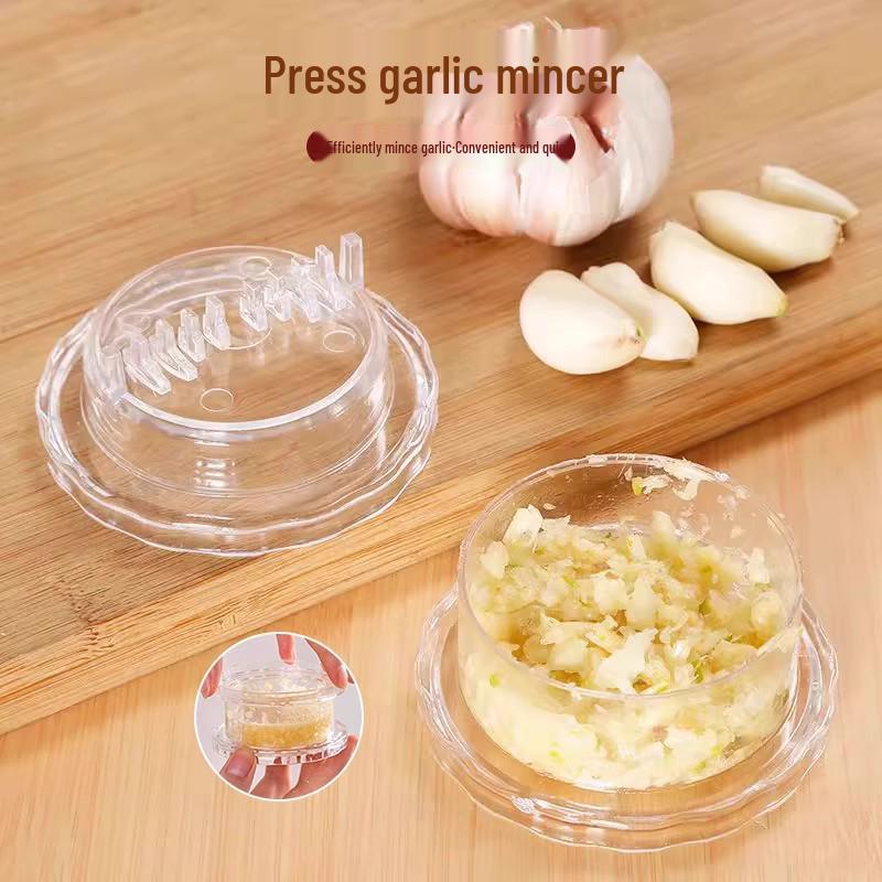 

Garlic Press & Mincer: 8-in-1 Kitchen Tool for Pressing, Twisting, Juicing, Mashing, Grinding, Chopping, Peeling, and Mincing Garlic.