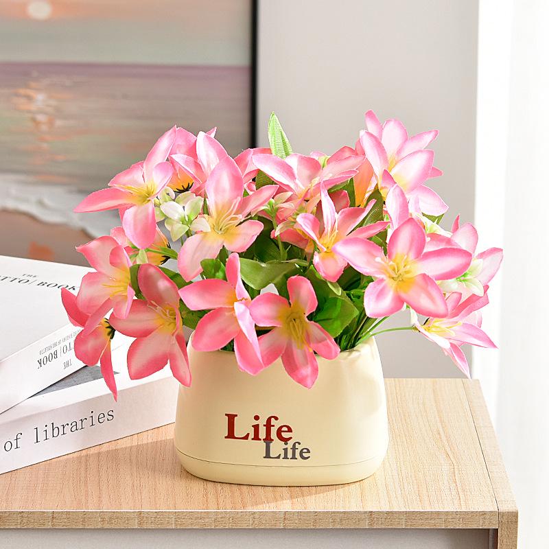 Living Room Decor: Artificial Sunflower and Green Plant Arrangements, Small Potted Plants, and Plastic Bouquets