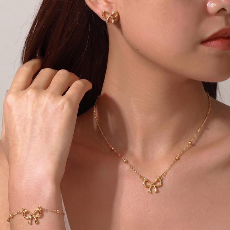 3Pcs Stainless Steel Delicate Golden Colour Fashion Bow Neckle Bracelet Earrings Titanium Jewelry Set Bow Pendant Accessory