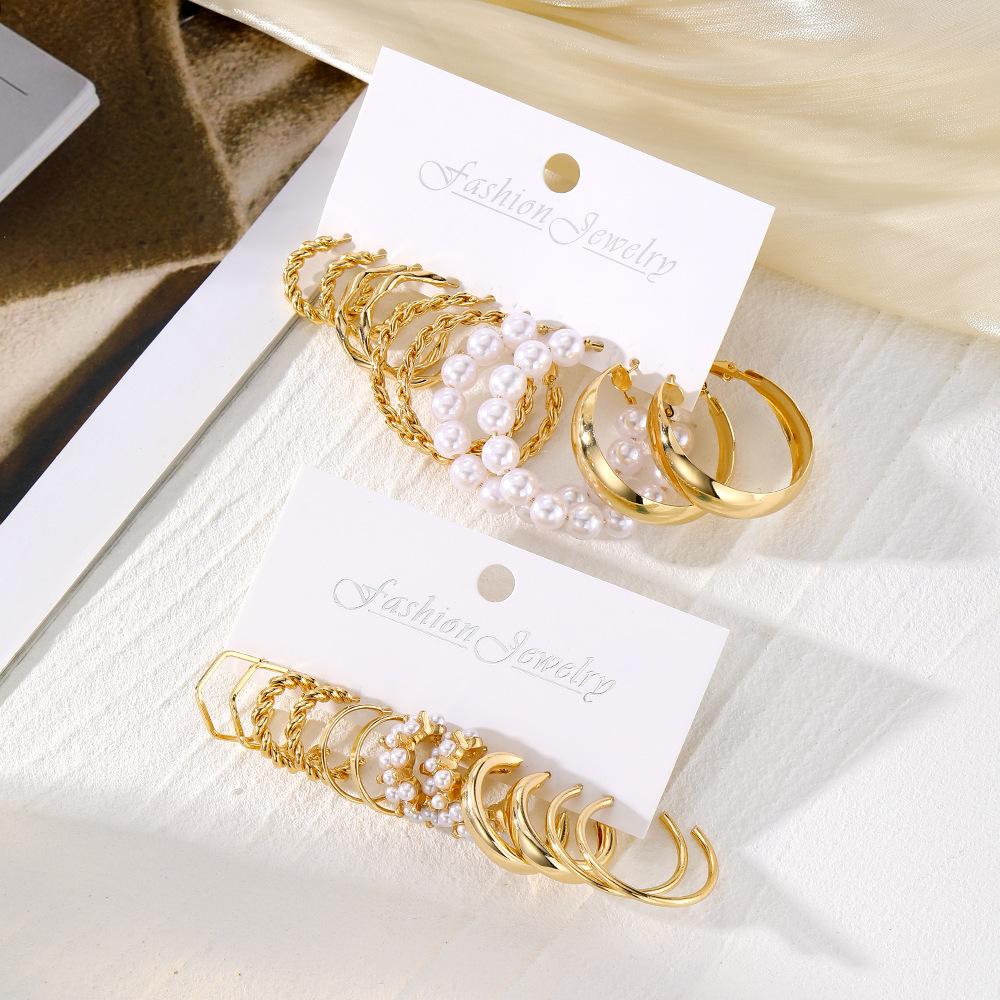 European and American-style, subtly luxurious, fashionable twisted-design earrings with diamond and pearl embellishments11New metal geometric