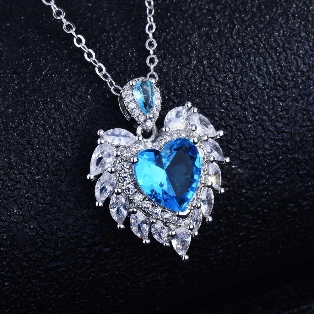 Angel Wing Pendant Necklace with Simulated Aquamarine Heart Wing Jewelry Design for Women