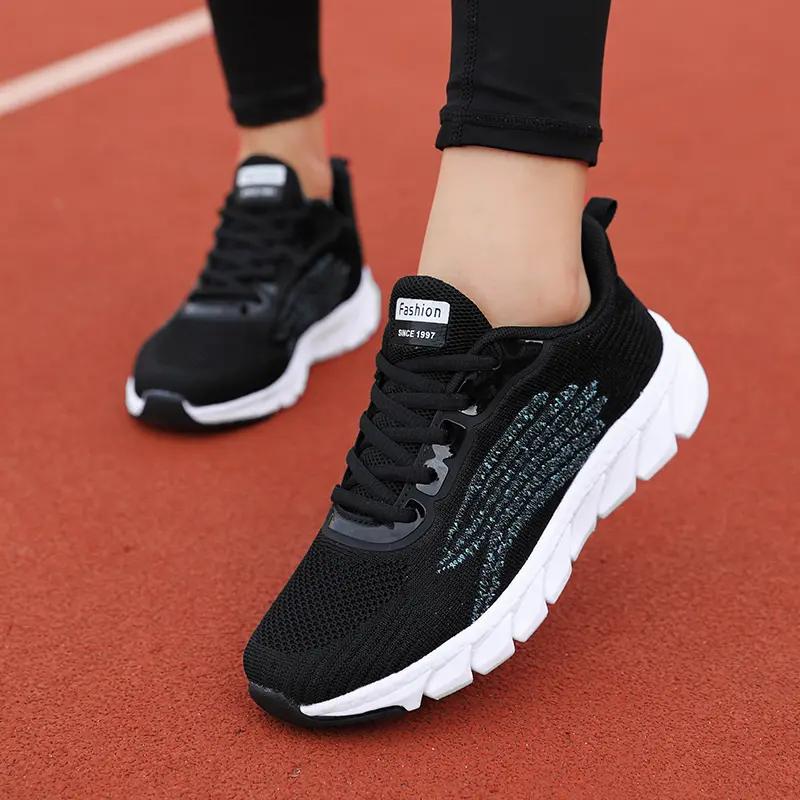 Fashion Spring Flying Knitted Breathable Running Shoes Sports Women Casual Shoes Soft Sole Couples Men And Women Small White Shoes
