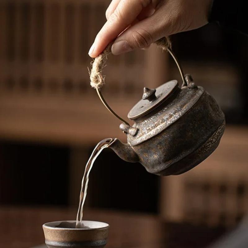 Japon Fırın Değişimi Yaldızlı Demir Sır Çaydanlık Butik Kaldırma Kirişli Çaydanlık Ev Çay Makinesi Su Isıtıcısı Kung Fu Çay Çay Takımı Süsleri