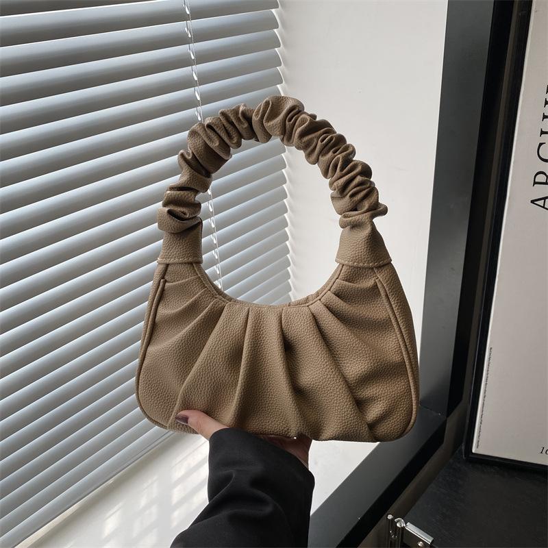 Folded portable cloud bag summer new dumpling bag beautiful solid color niche trend texture shoulder women's bag