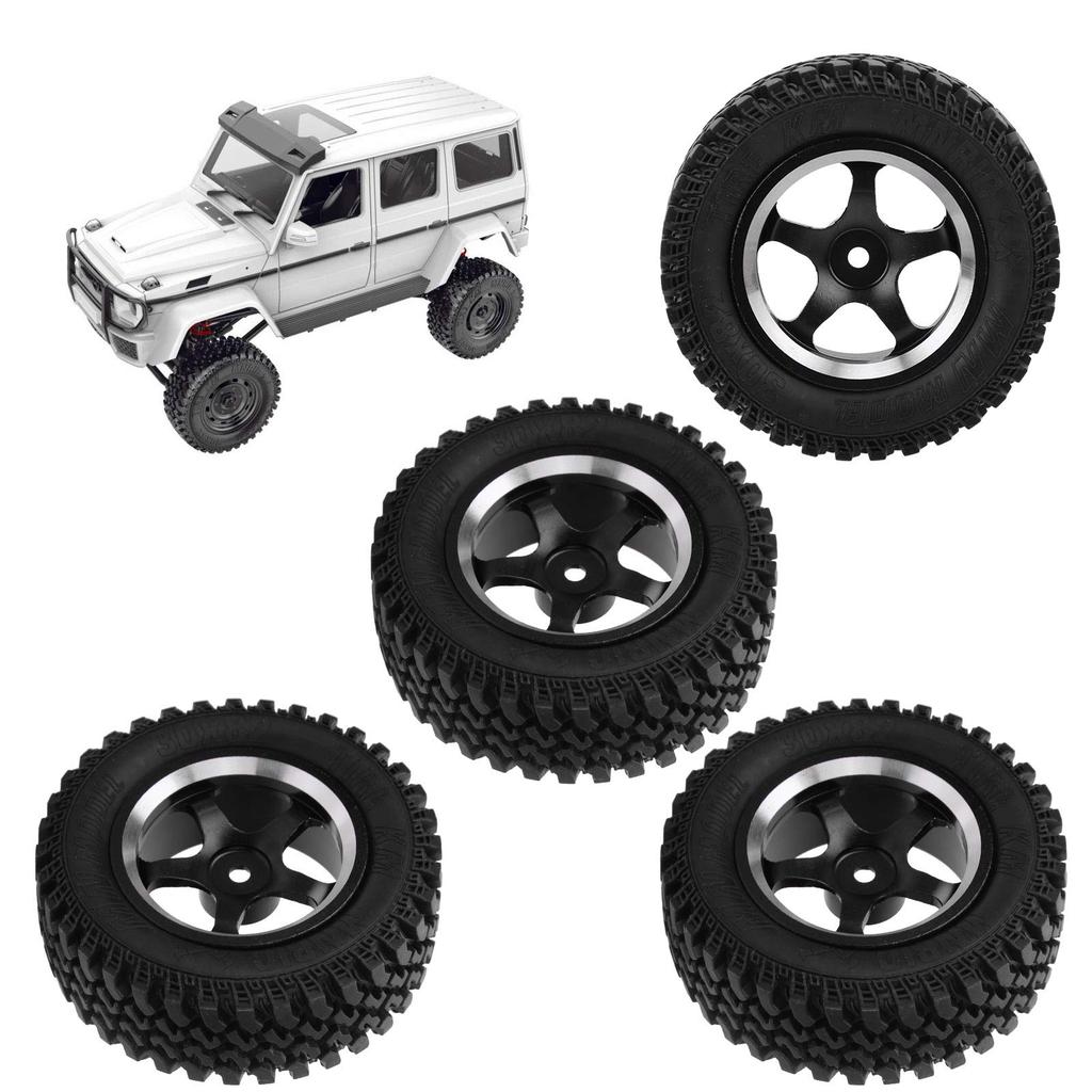 Set aus 4 schwarzen Aluminium-Radnaben mit Gummireifen für 1:12 MN86 Auto Rote RC-Autoteile, Ersatzräder