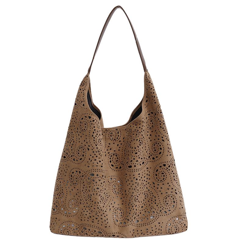 

Korean version of cross-flow underarm bag women s new mother and child bag large-capacity shoulder bag hollow versatile commuter leisure tote bag хаки