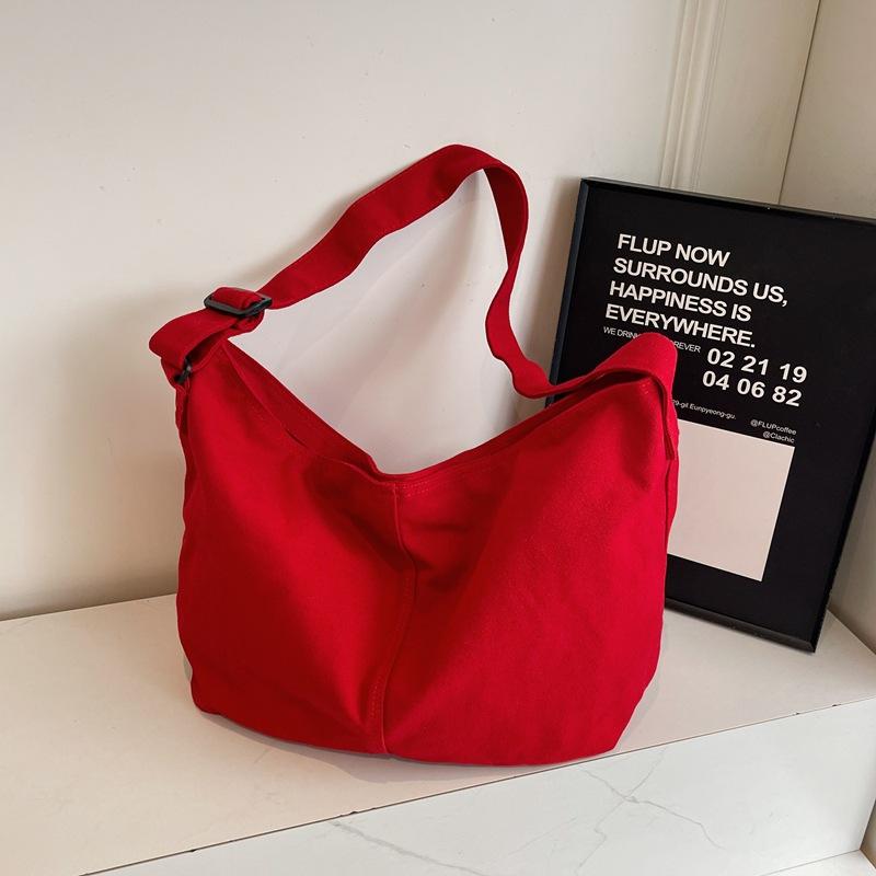 Bag women's new bag high-end canvas dumplings fashionable large-capacity shoulder messenger bag