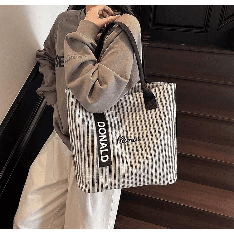 

Striped large-capacity canvas bag women s fashion portable shoulder shopping bag casual commuting tote bag