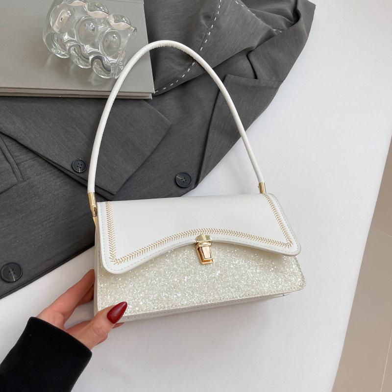 Damen neue Damentaschen sind leichter Luxus und vielseitig, kontrastierende Farben, hochwertiges Temperament und Aussehen, tragbare Schulter-Achseltasche.