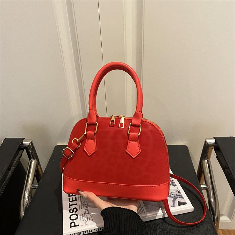 Fashion simple bag women's spring new Korean version portable shell bag simple casual shoulder messenger bag women