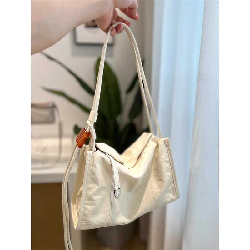 

Stylish and simple soft leather tote bag New casual portable handbag Niche oil wax leather design bag