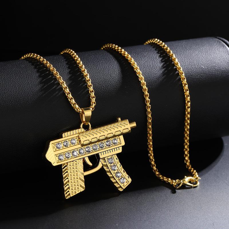 Hip-Hopowy naszyjnik z wisiorkiem w kształcie pistoletu maszynowego ze stopu: Wszechstronna biżuteria z diamentami dla mężczyzn i kobiet
